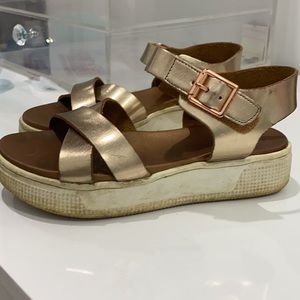 Girls MIA rose gold wedges.
